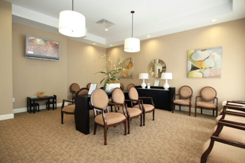 sitting area with brown chairs